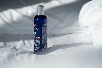 blue and white labeled bottle