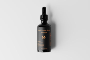a bottle of mf hair growth oil on a white background